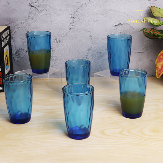 Set of 6 versatile glass tumblers - perfect for refreshing juices and water.