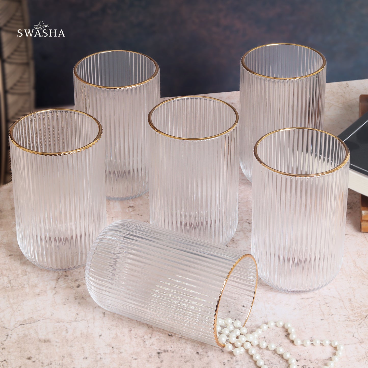 Set of 6 versatile glass tumblers - perfect for refreshing juices and water.