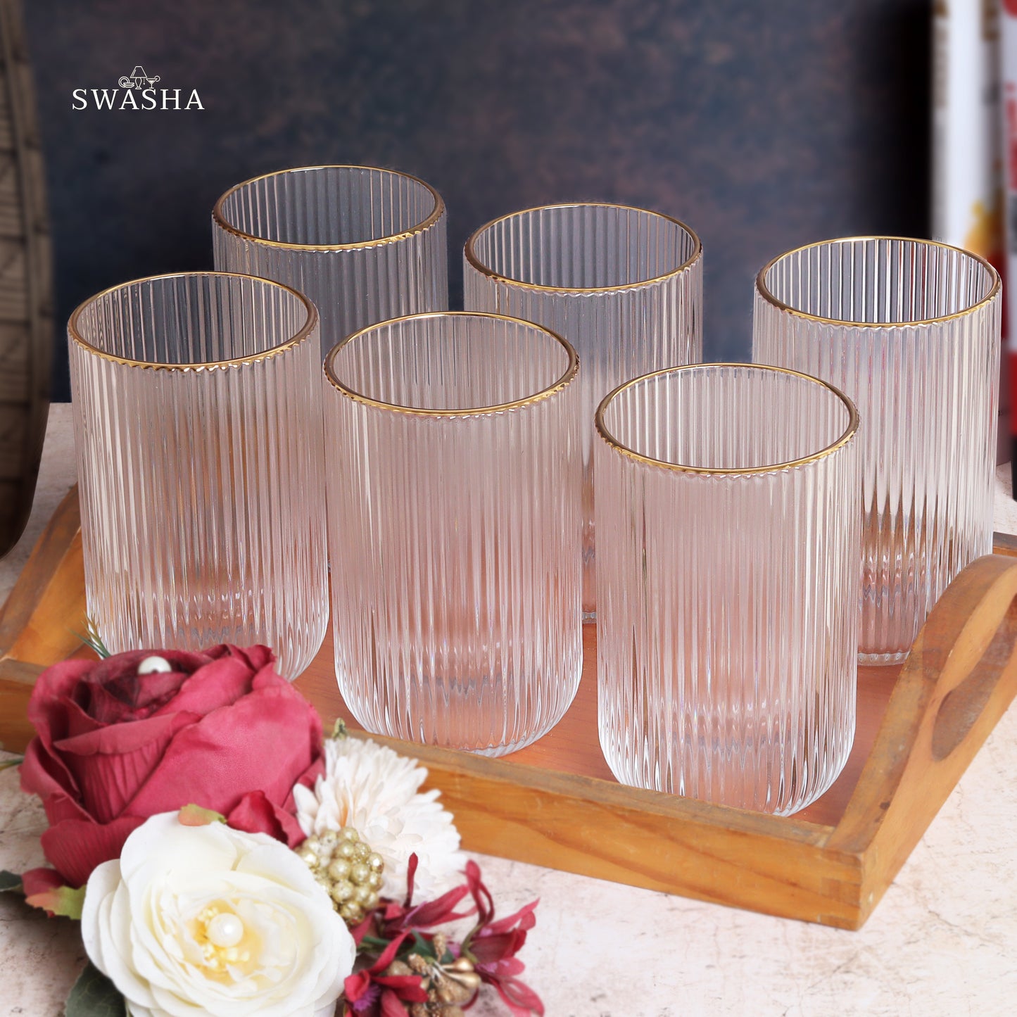 Set of 6 versatile glass tumblers - perfect for refreshing juices and water.