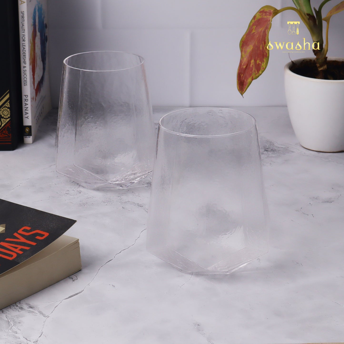 Set of 6 versatile glass tumblers - perfect for refreshing juices and water.