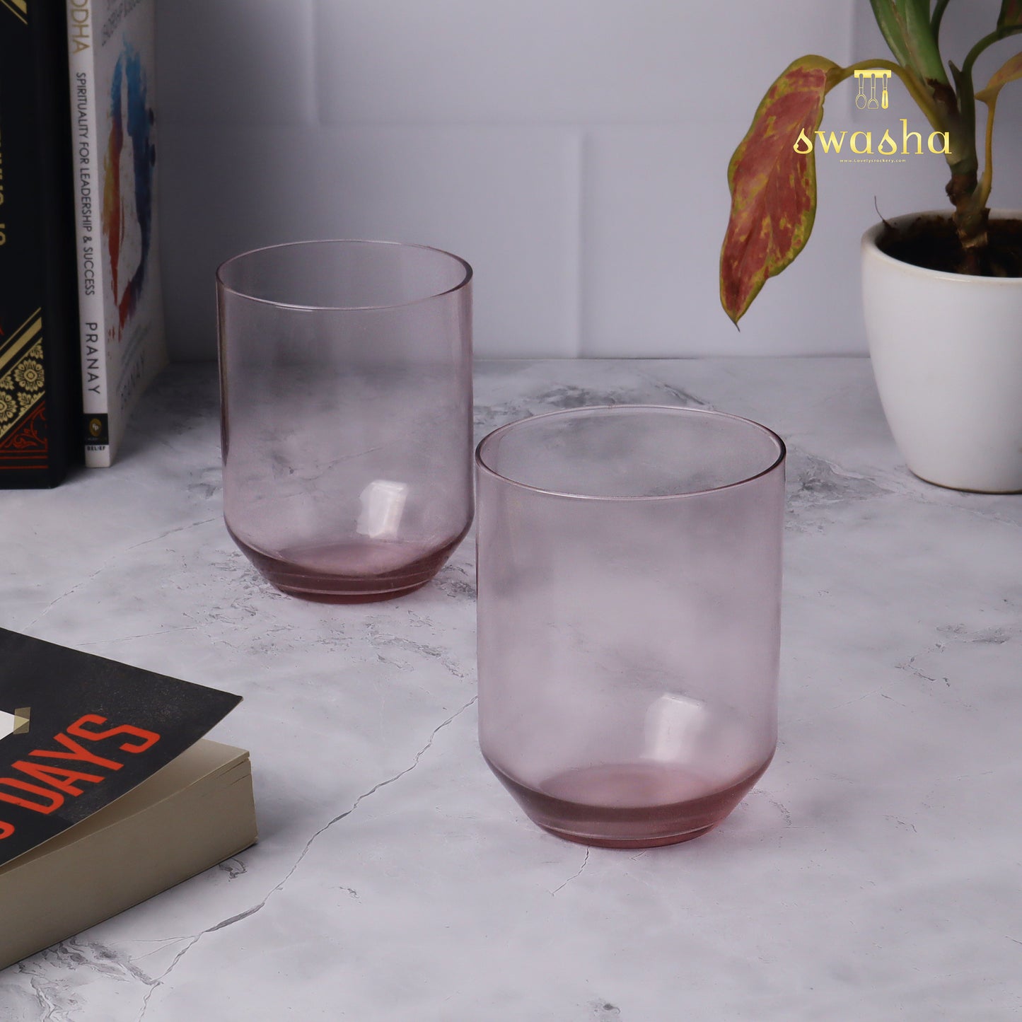 Set of 6 versatile glass tumblers - perfect for refreshing juices and water.