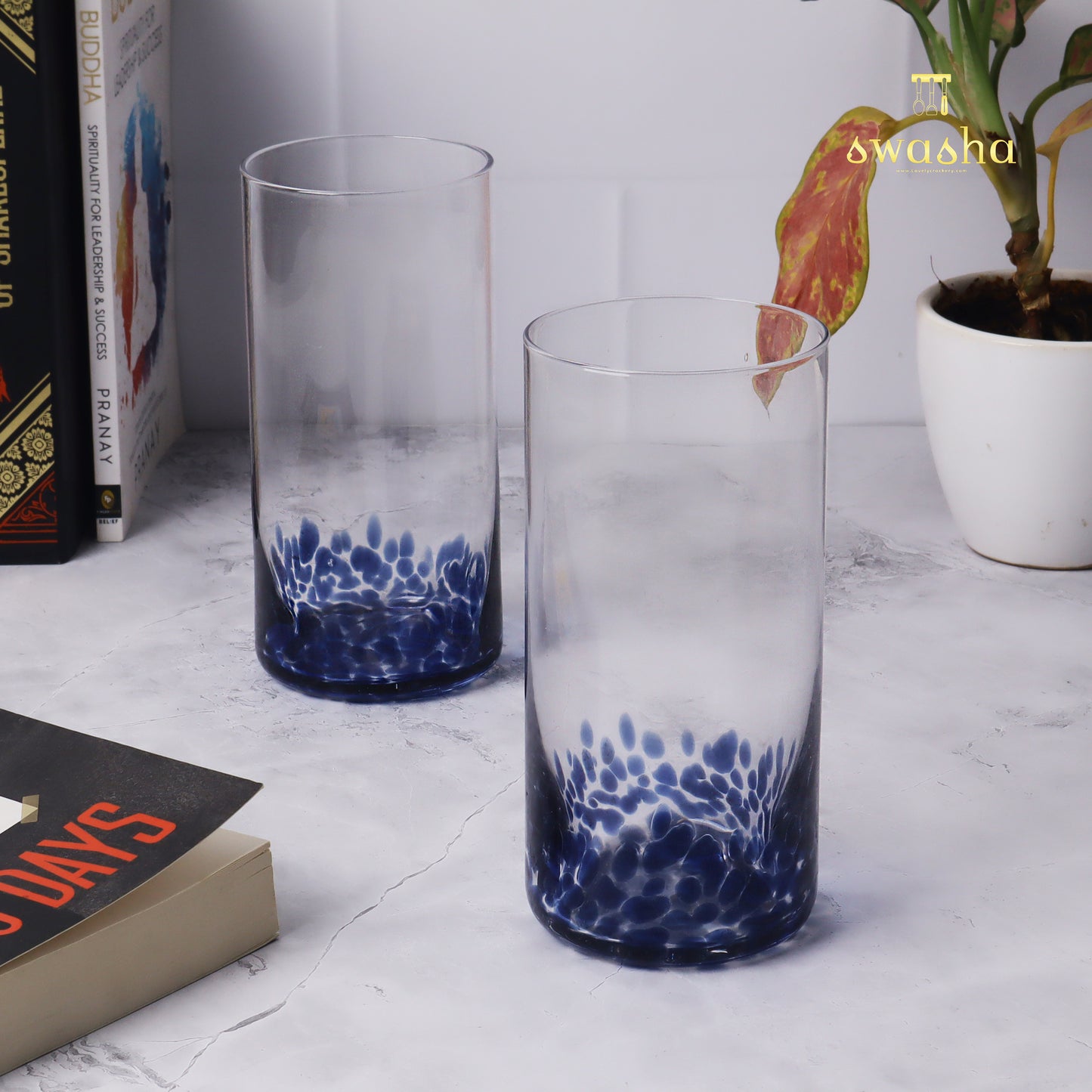 Set of 6 versatile glass tumblers - perfect for refreshing juices and water.