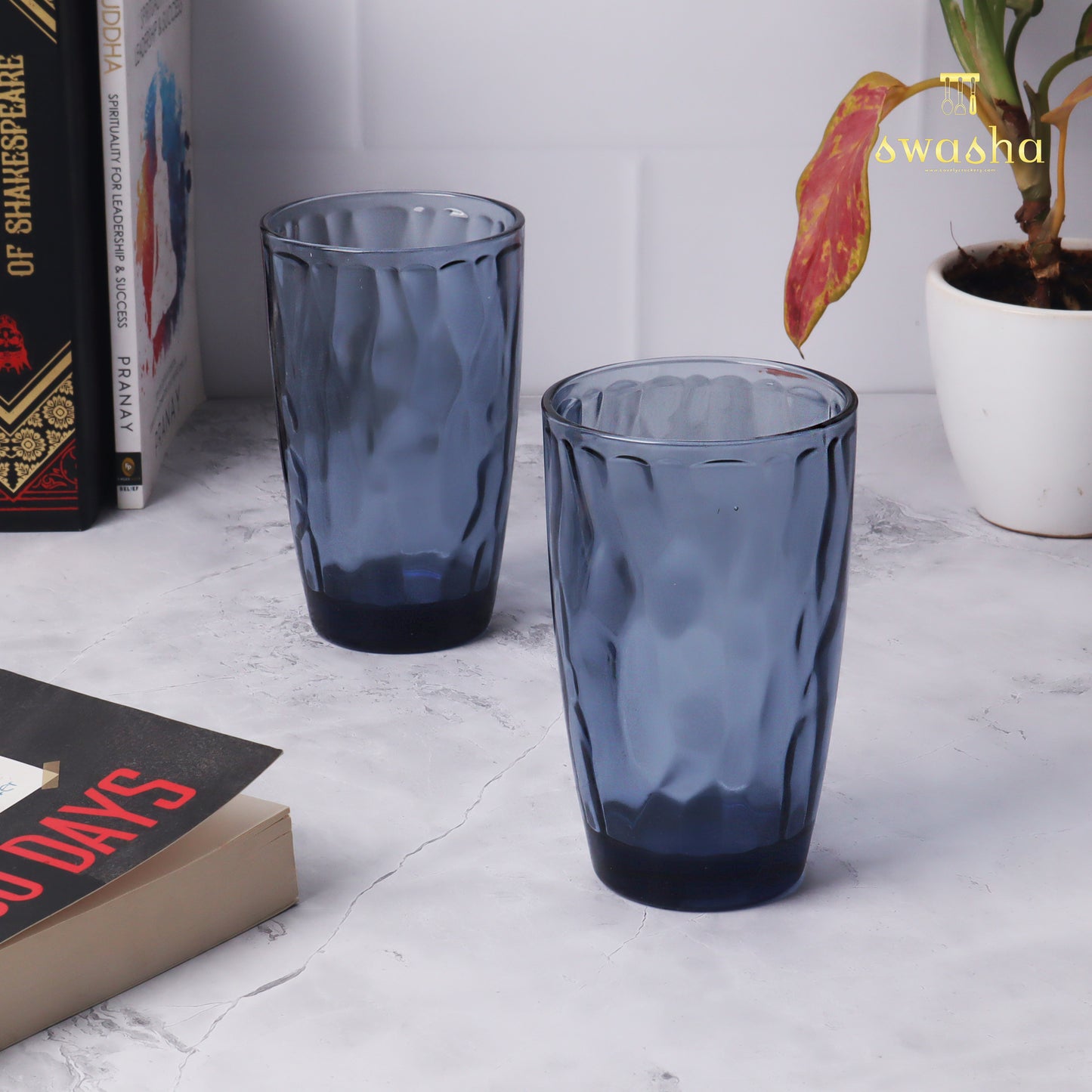 Set of 6 versatile glass tumblers - perfect for refreshing juices and water.