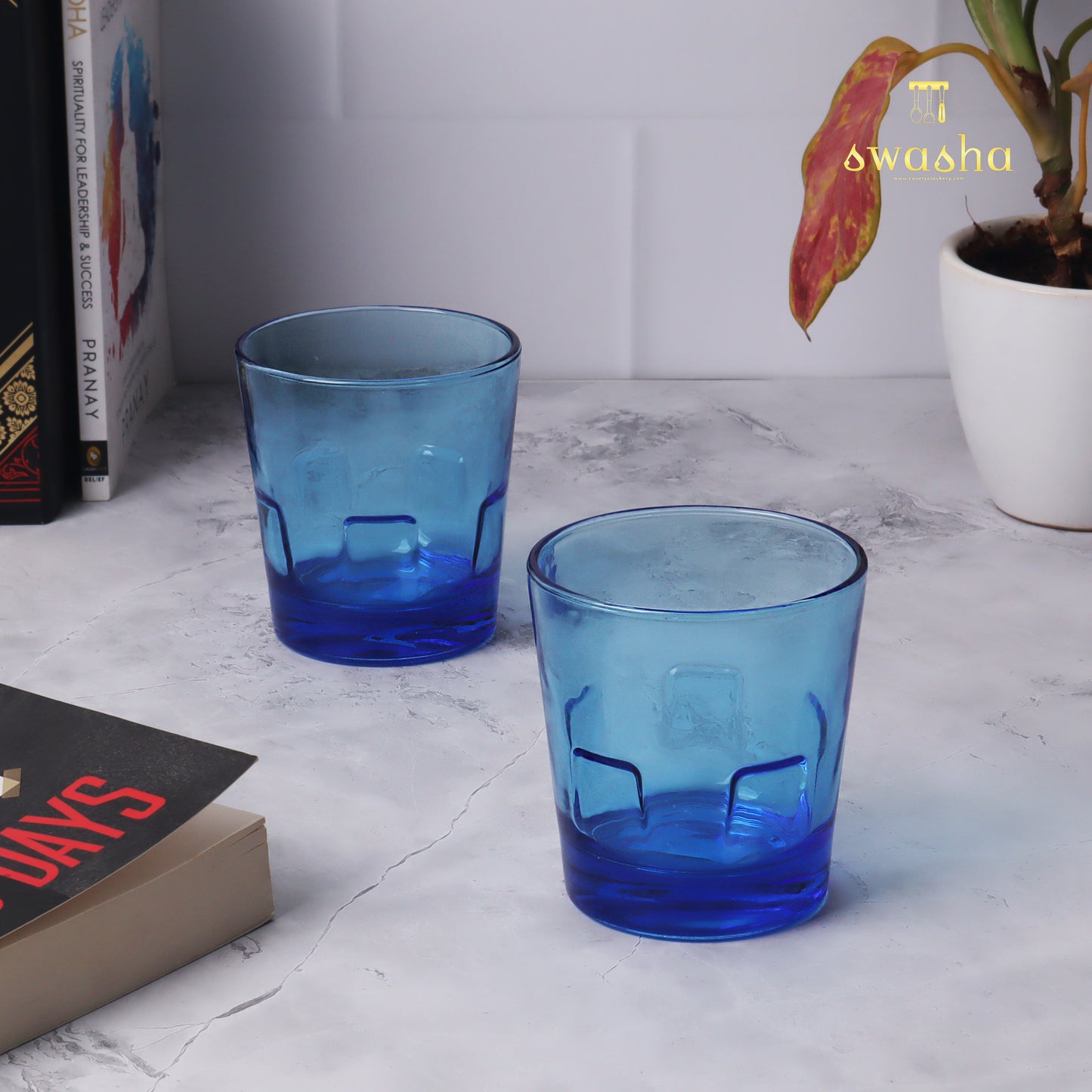 Set of 6 versatile glass tumblers - perfect for refreshing juices and water.