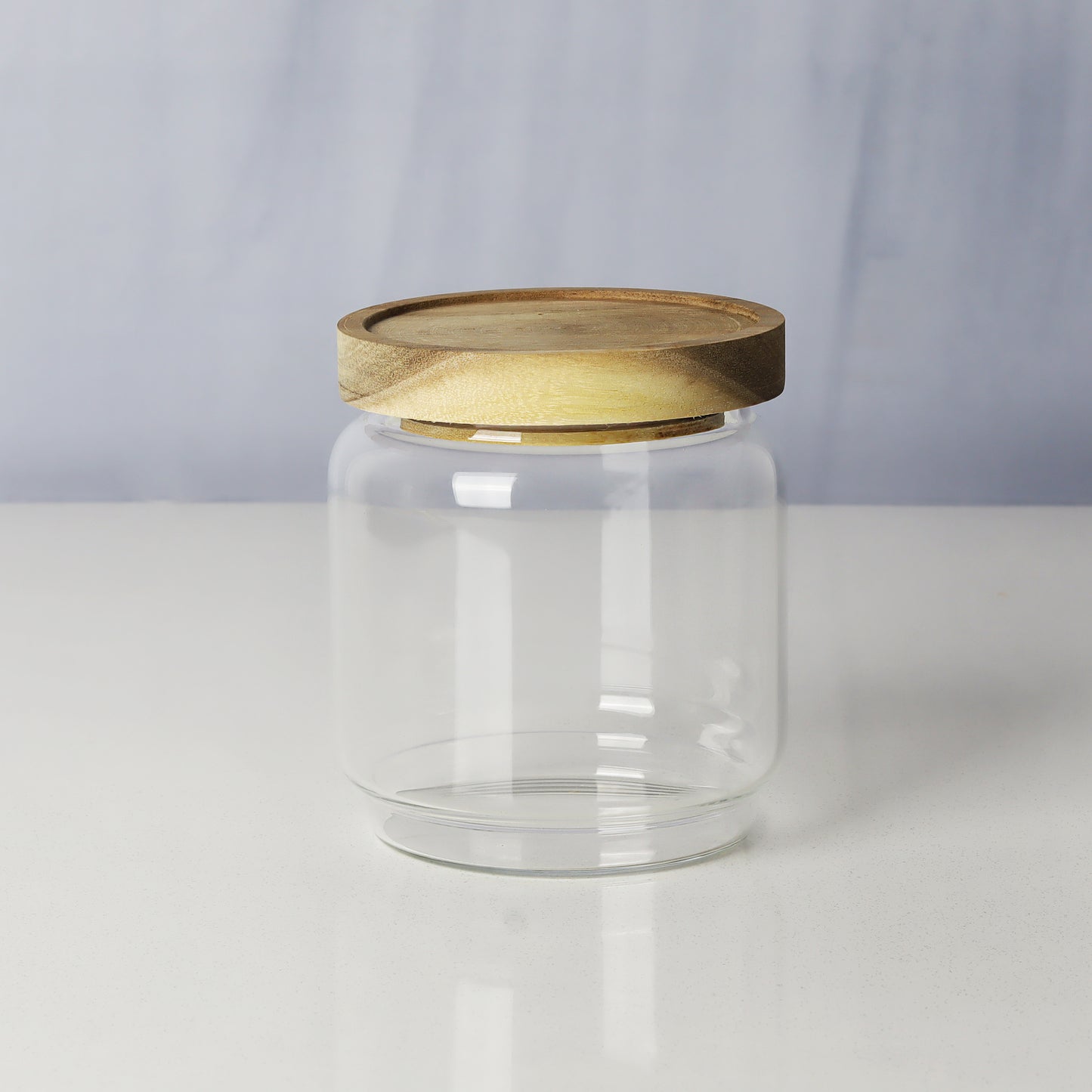 Glass jars/containers with stylish wooden lids - ideal for organized storage solutions