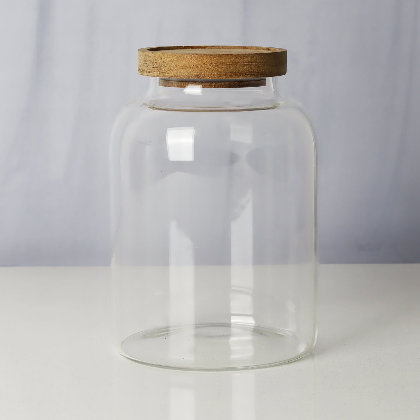 Glass jars/containers with stylish wooden lids - ideal for organized storage solutions