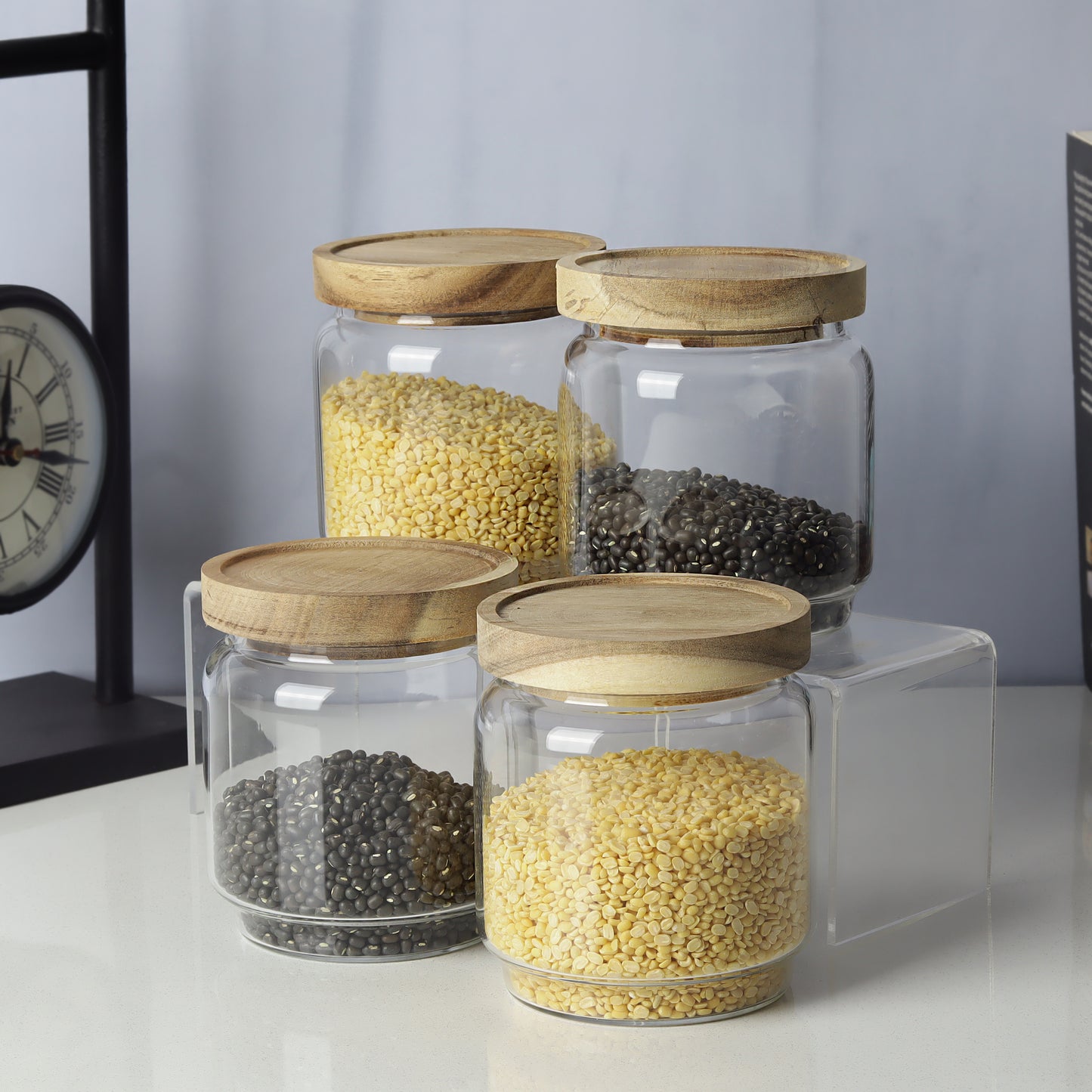 Glass jars/containers with stylish wooden lids - ideal for organized storage solutions