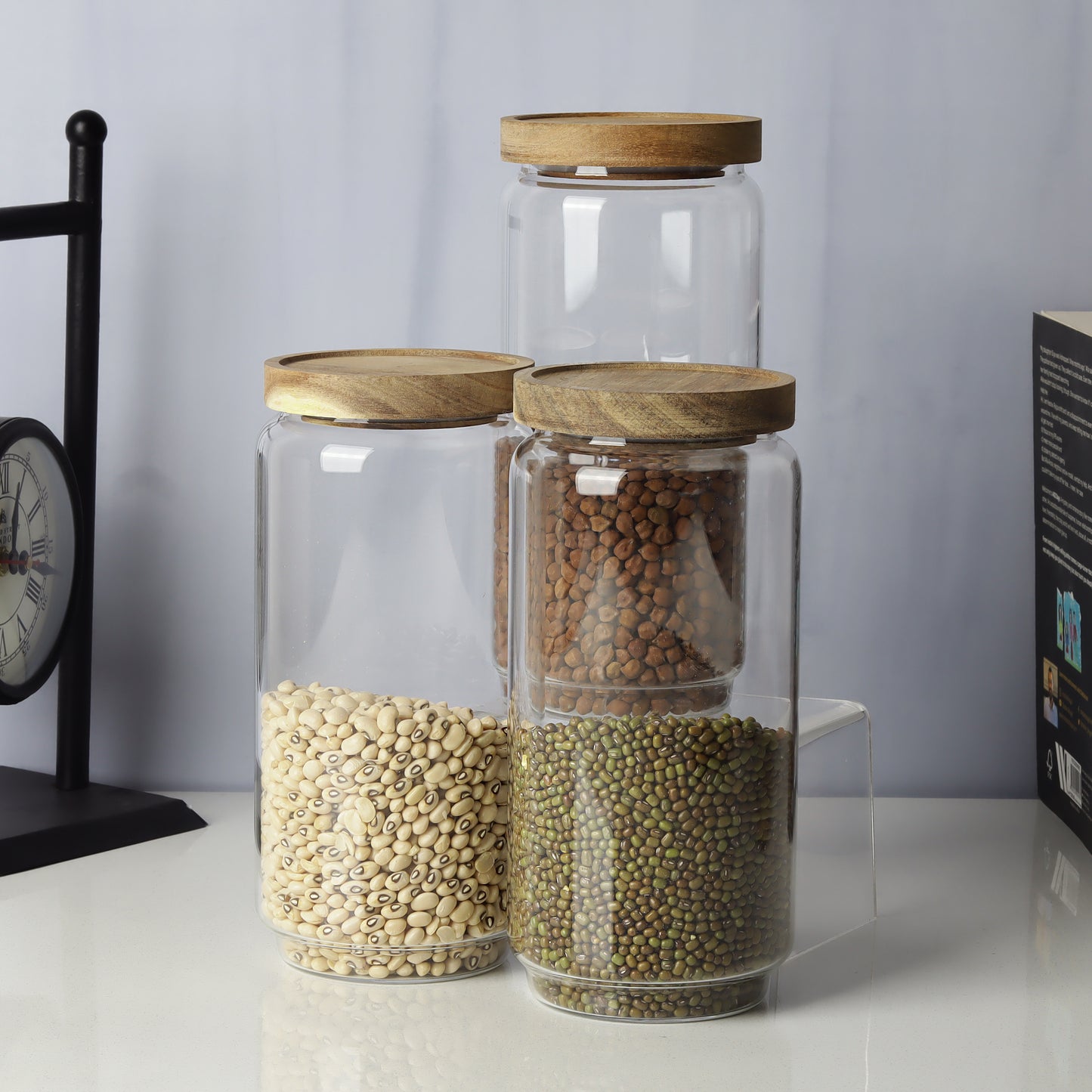 Glass jars/containers with stylish wooden lids - ideal for organized storage solutions