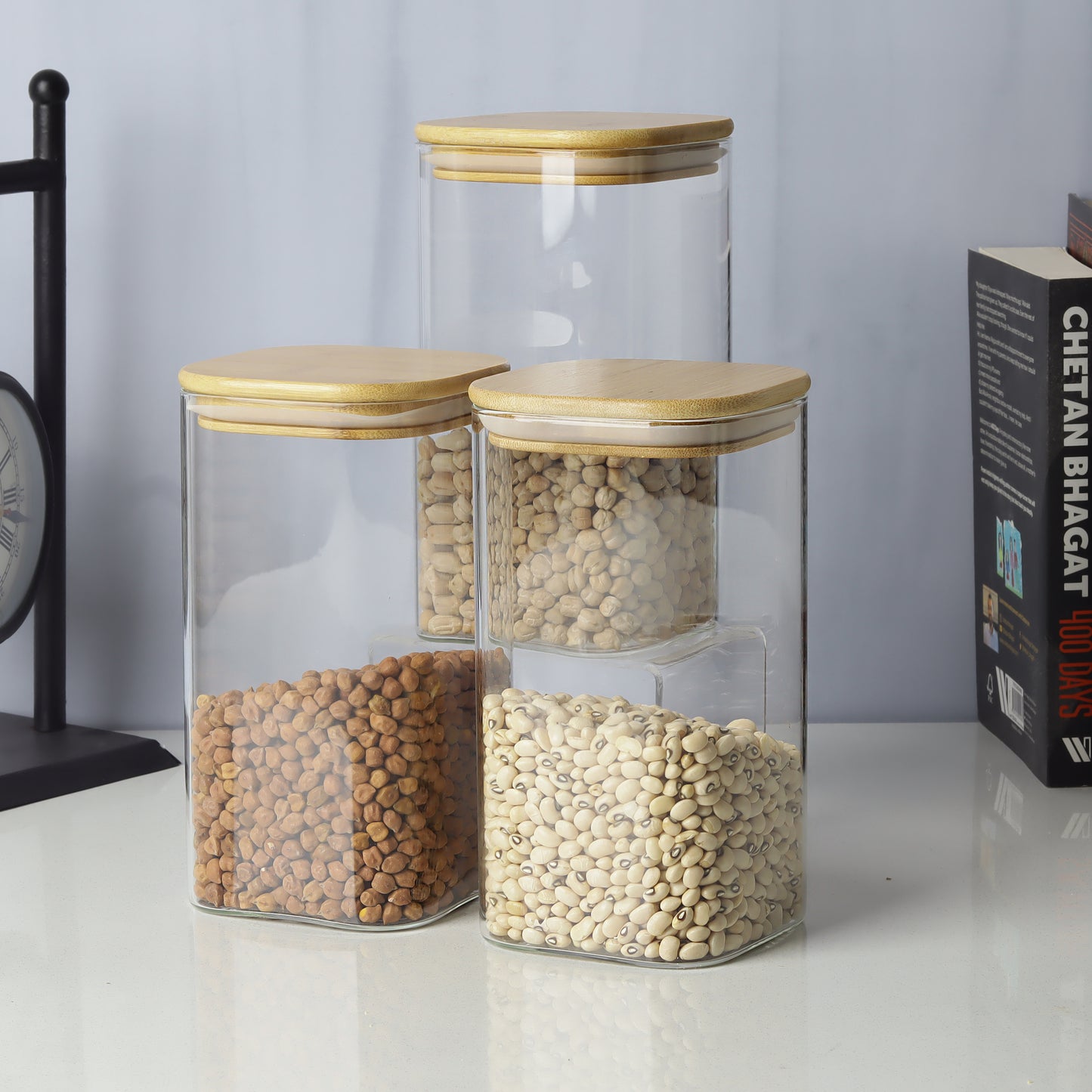 Glass jars/containers with stylish wooden lids - ideal for organized storage solutions