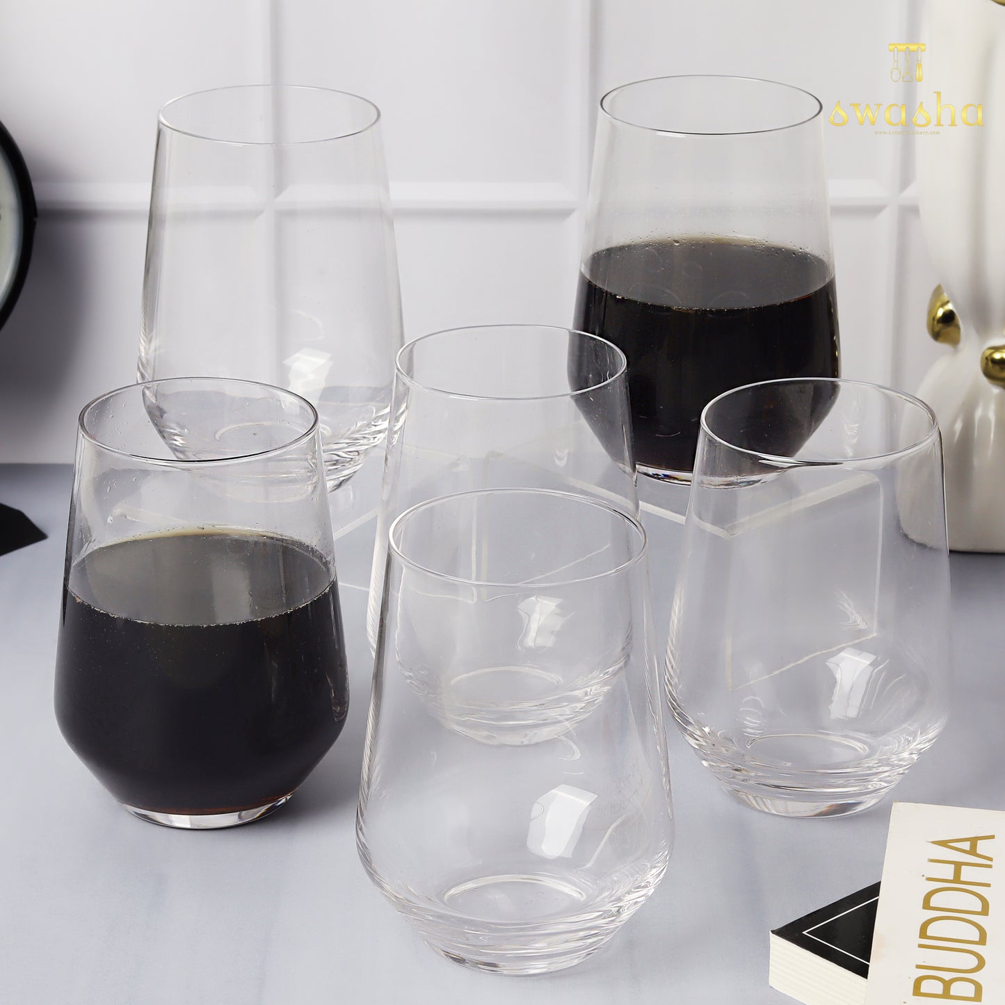Set of 6 versatile glass tumblers - perfect for refreshing juices, whiskey and water.