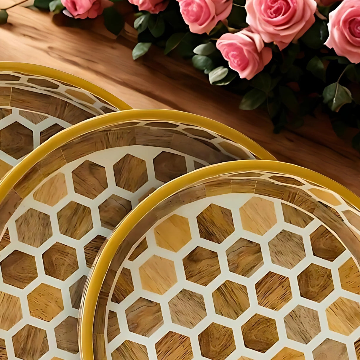 Wooden trays with hexagonal pattern on a wooden surface