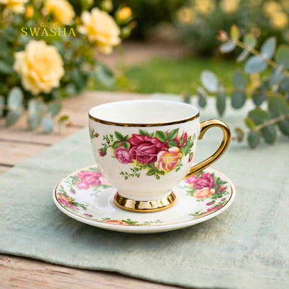 Swasha vintage floral cup saucer set of 6 english rose print with gold rim and gold foot on green table