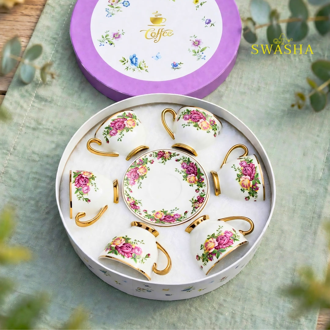 Swasha vintage floral cup saucer set of 6 english rose print with gold rim and gold foot on green table