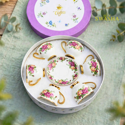 Swasha vintage floral cup saucer set of 6 english rose print with gold rim and gold foot on green table