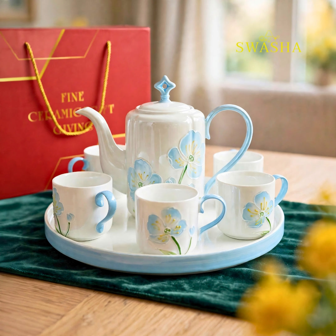 Swasha sky blue poppy 8 pcs revolving tea set 900ml kettle 150ml cups 3d blue floral embossed light blue handle revolving tray with red gift box