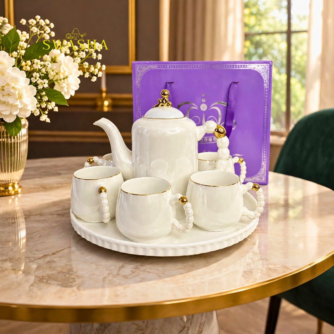 Swasha pearl 8 pcs revolving tea set white ceramic kettle with 6 cups pearl handle gold rim and revolving tray with purple gift bag