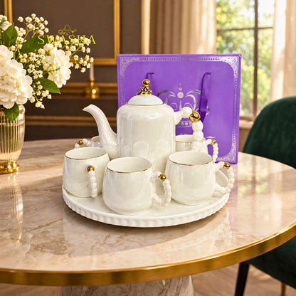 Swasha pearl 8 pcs revolving tea set white ceramic kettle with 6 cups pearl handle gold rim and revolving tray with purple gift bag