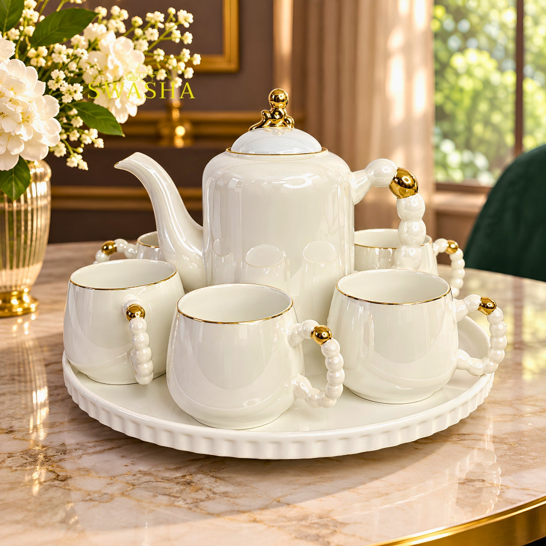 Swasha pearl 8 pcs revolving tea set white ceramic kettle with 6 cups pearl handle gold rim and revolving tray with purple gift bag