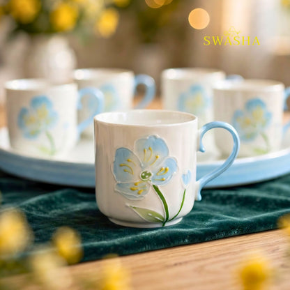 Swasha sky blue poppy 8 pcs revolving tea set 900ml kettle 150ml cups 3d blue floral embossed light blue handle revolving tray with red gift box