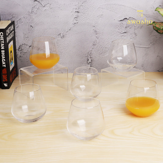 Set of 6 versatile glass tumblers - perfect for refreshing juices and water.