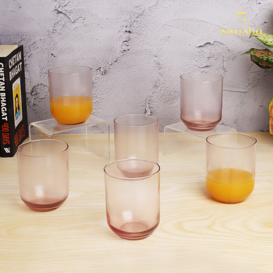 Set of 6 versatile glass tumblers - perfect for refreshing juices and water.