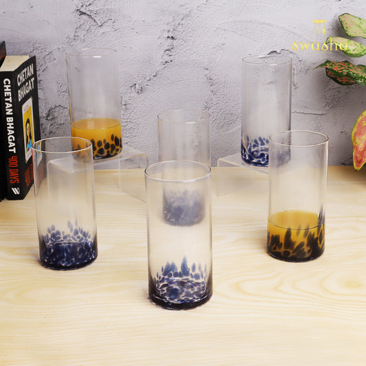 Set of 6 versatile glass tumblers - perfect for refreshing juices and water.