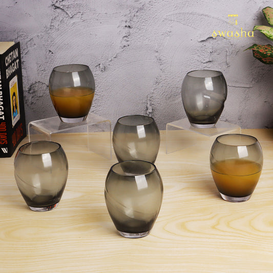 Set of 6 versatile glass tumblers - perfect for refreshing juices and water.