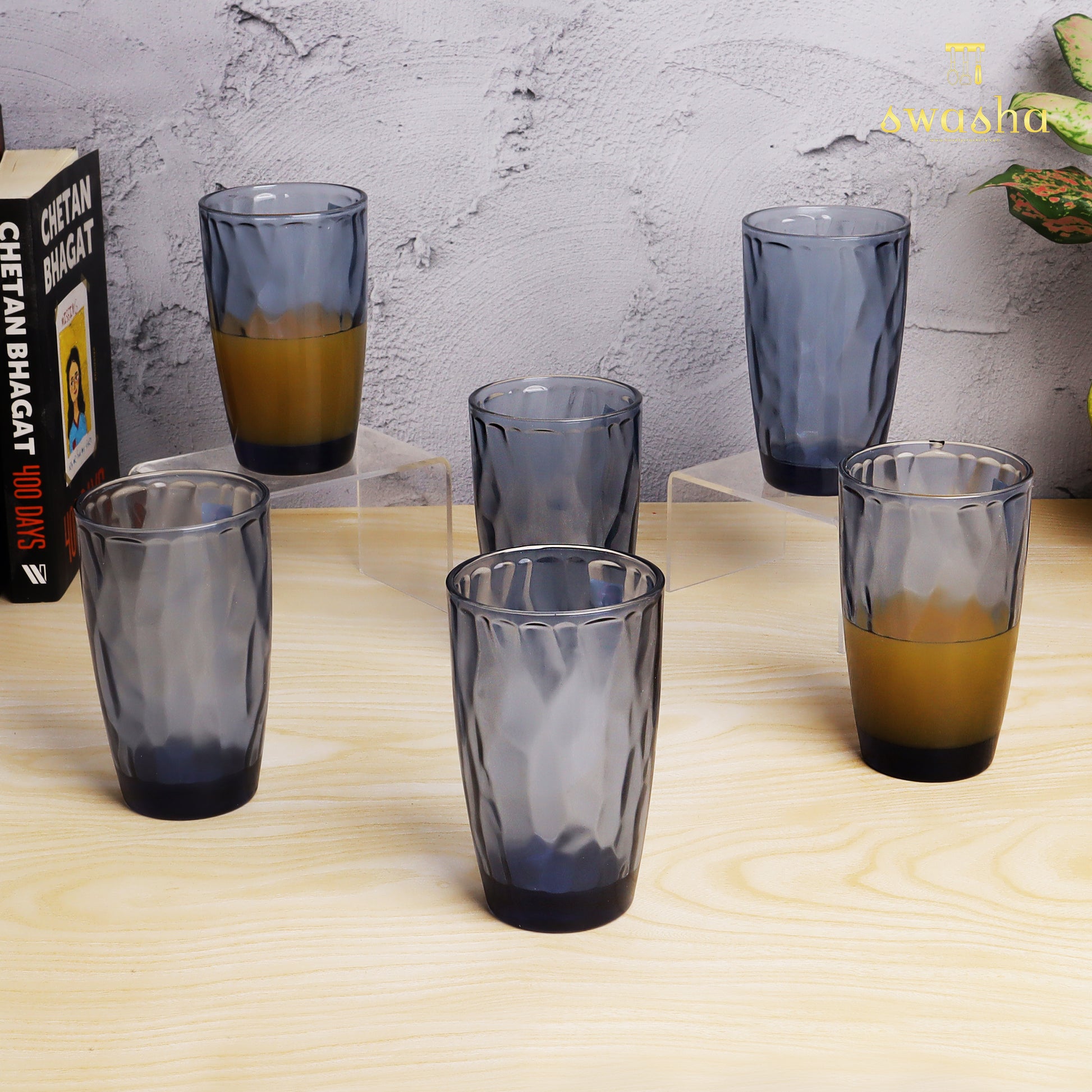 Set of 6 versatile glass tumblers - perfect for refreshing juices and water.