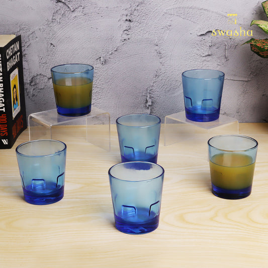 Set of 6 versatile glass tumblers - perfect for refreshing juices and water.