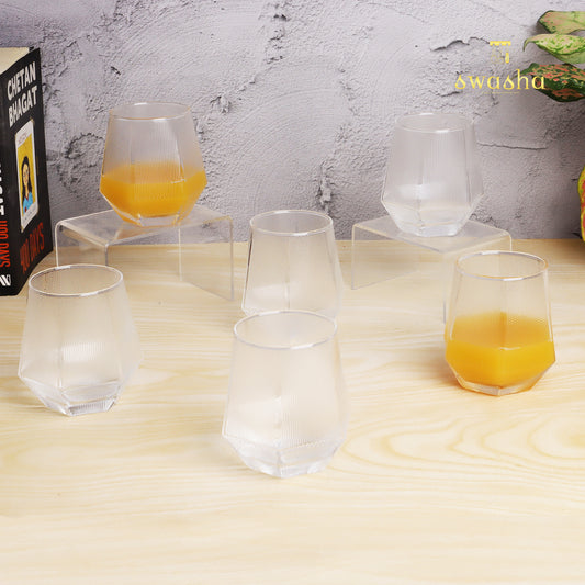 Set of 6 versatile glass tumblers - perfect for refreshing juices and water.