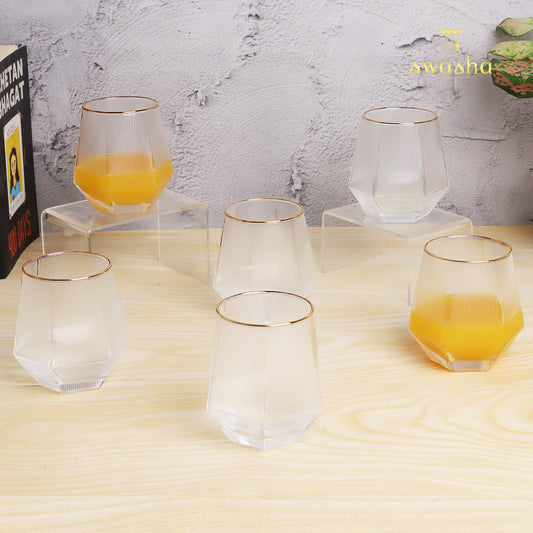 Set of 6 versatile glass tumblers - perfect for refreshing juices and water.