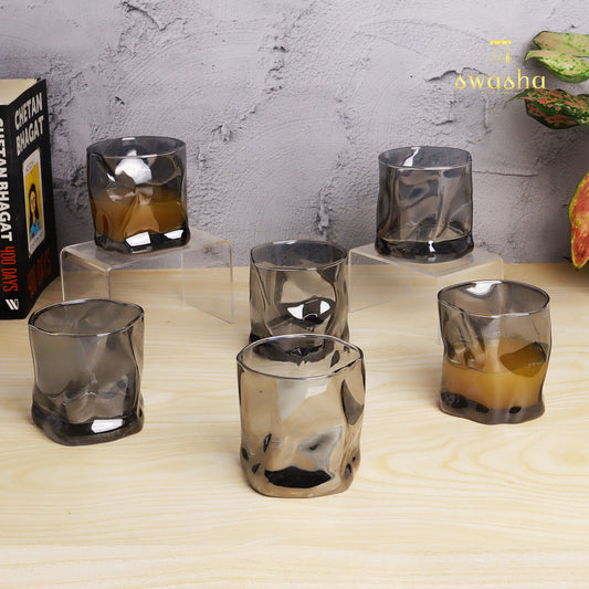 Set of 6 versatile glass tumblers - perfect for refreshing juices and water.