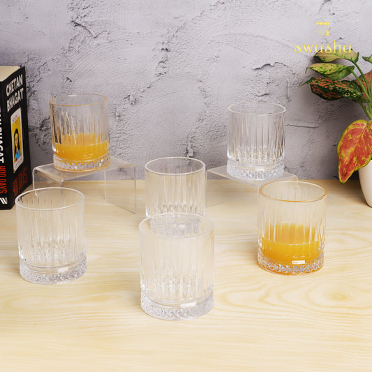 Set of 6 versatile glass tumblers - perfect for refreshing juices and water.