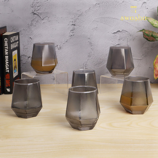 Set of 6 versatile glass tumblers - perfect for refreshing juices and water.