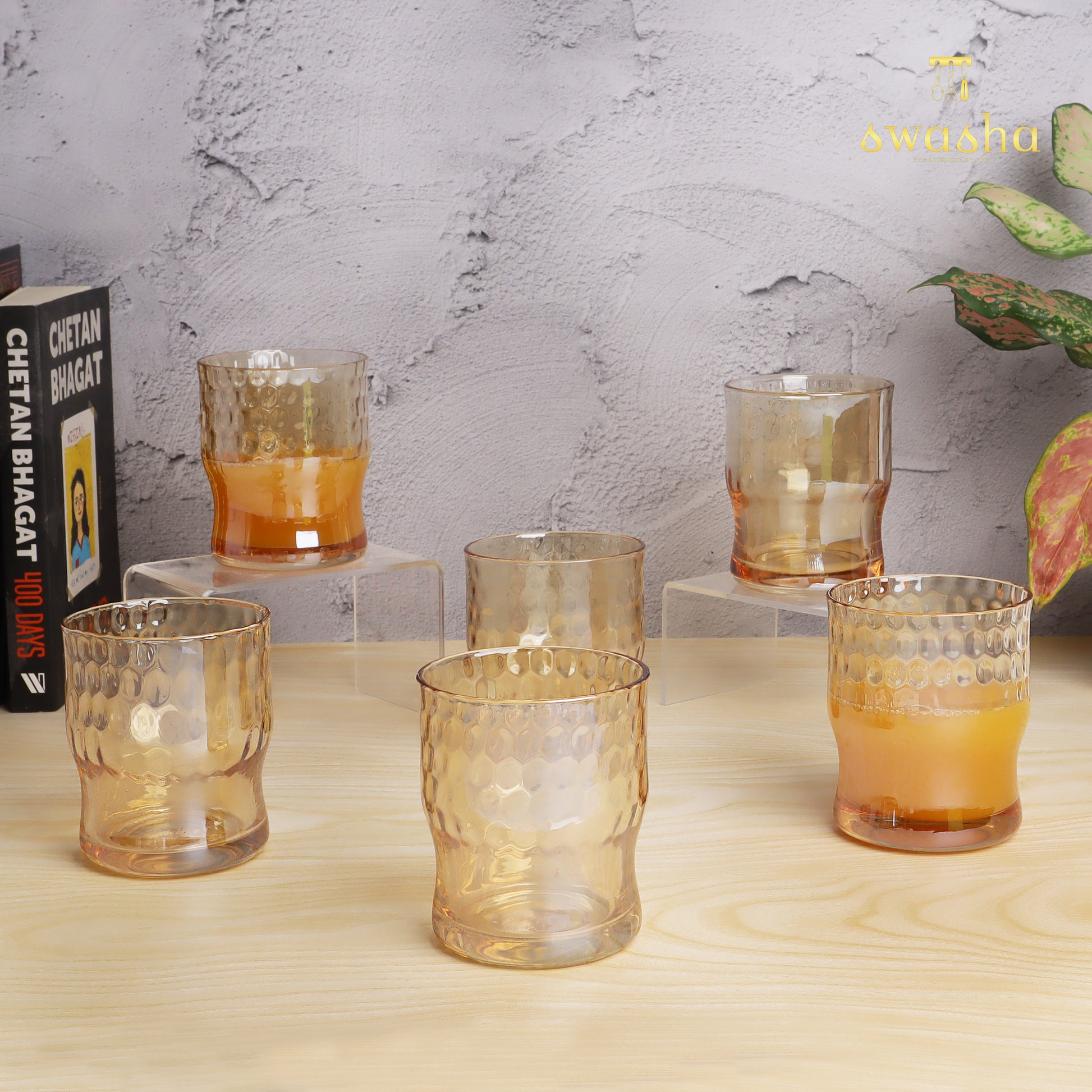 Set of 6 versatile glass tumblers - perfect for refreshing juices and water.