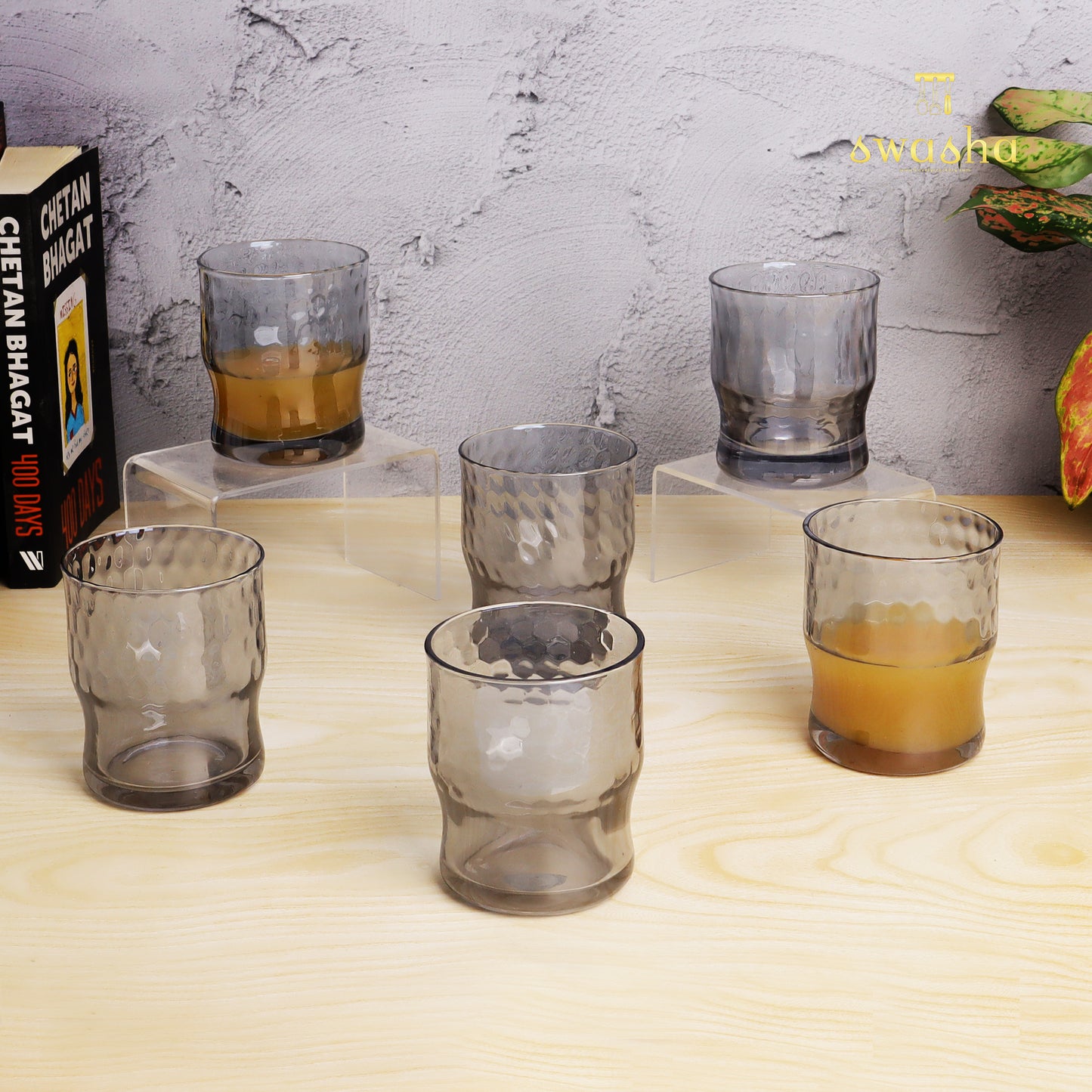 Set of 6 versatile glass tumblers - perfect for refreshing juices and water.