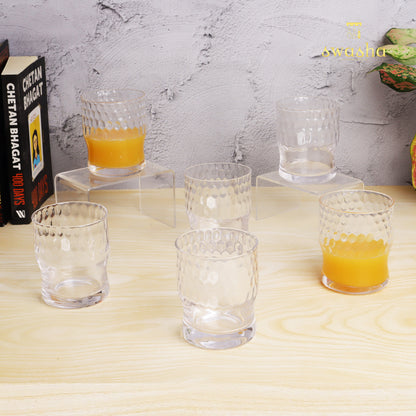 Set of 6 versatile glass tumblers - perfect for refreshing juices and water.