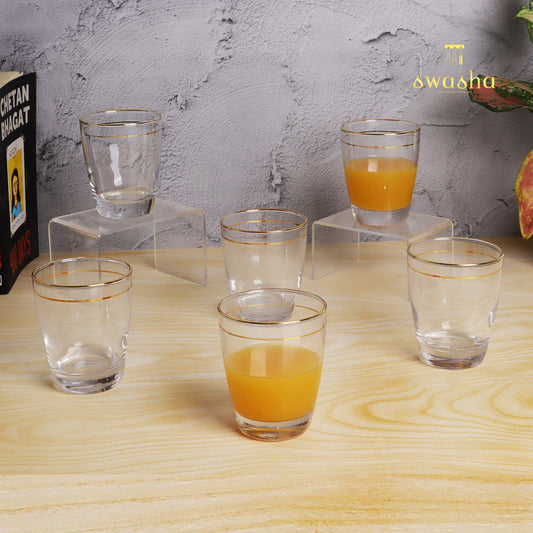 Set of 6 versatile glass tumblers - perfect for refreshing juices and water.