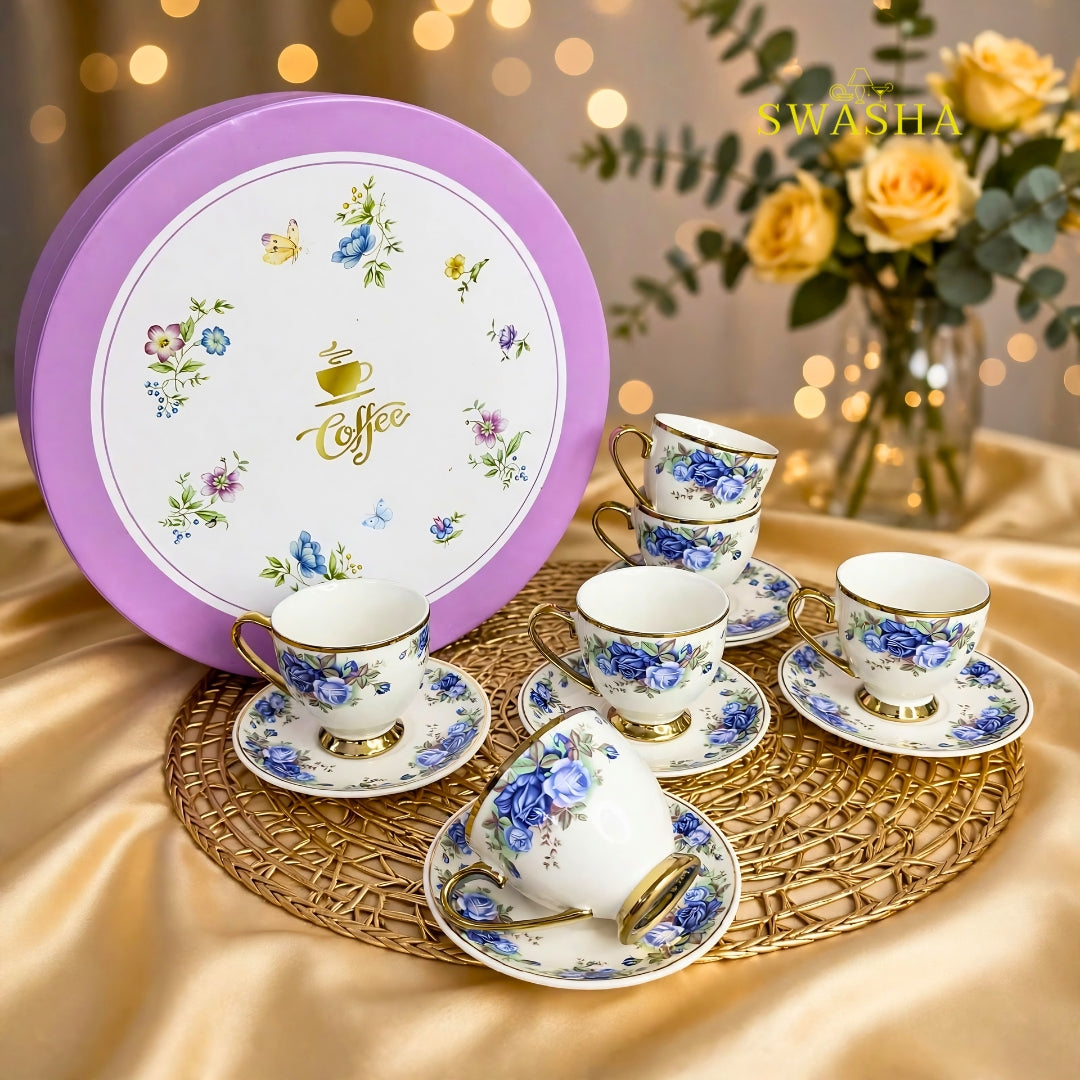 Swasha royal blue floral cup saucer set of 6 blue rose print with gold rim and gold foot on golden table mat with spoon