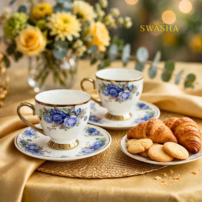 Swasha royal blue floral cup saucer set of 6 blue rose print with gold rim and gold foot on golden table mat with spoon