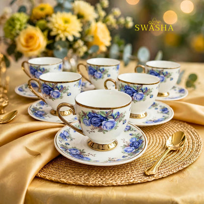 Swasha royal blue floral cup saucer set of 6 blue rose print with gold rim and gold foot on golden table mat with spoon