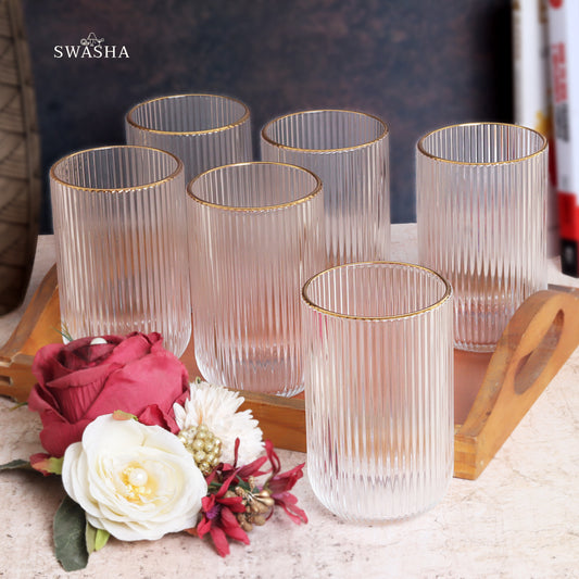 Set of 6 versatile glass tumblers - perfect for refreshing juices and water.