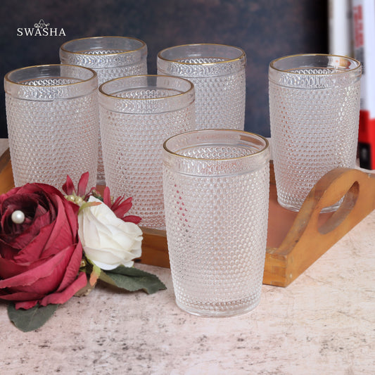 Set of 6 versatile glass tumblers - perfect for refreshing juices and water.