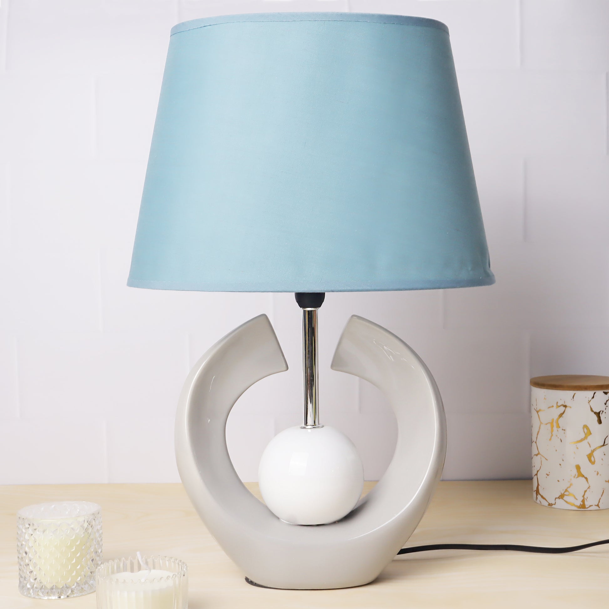  ceramic table lamp with textured base and linen shade, illuminating warmth and elegance