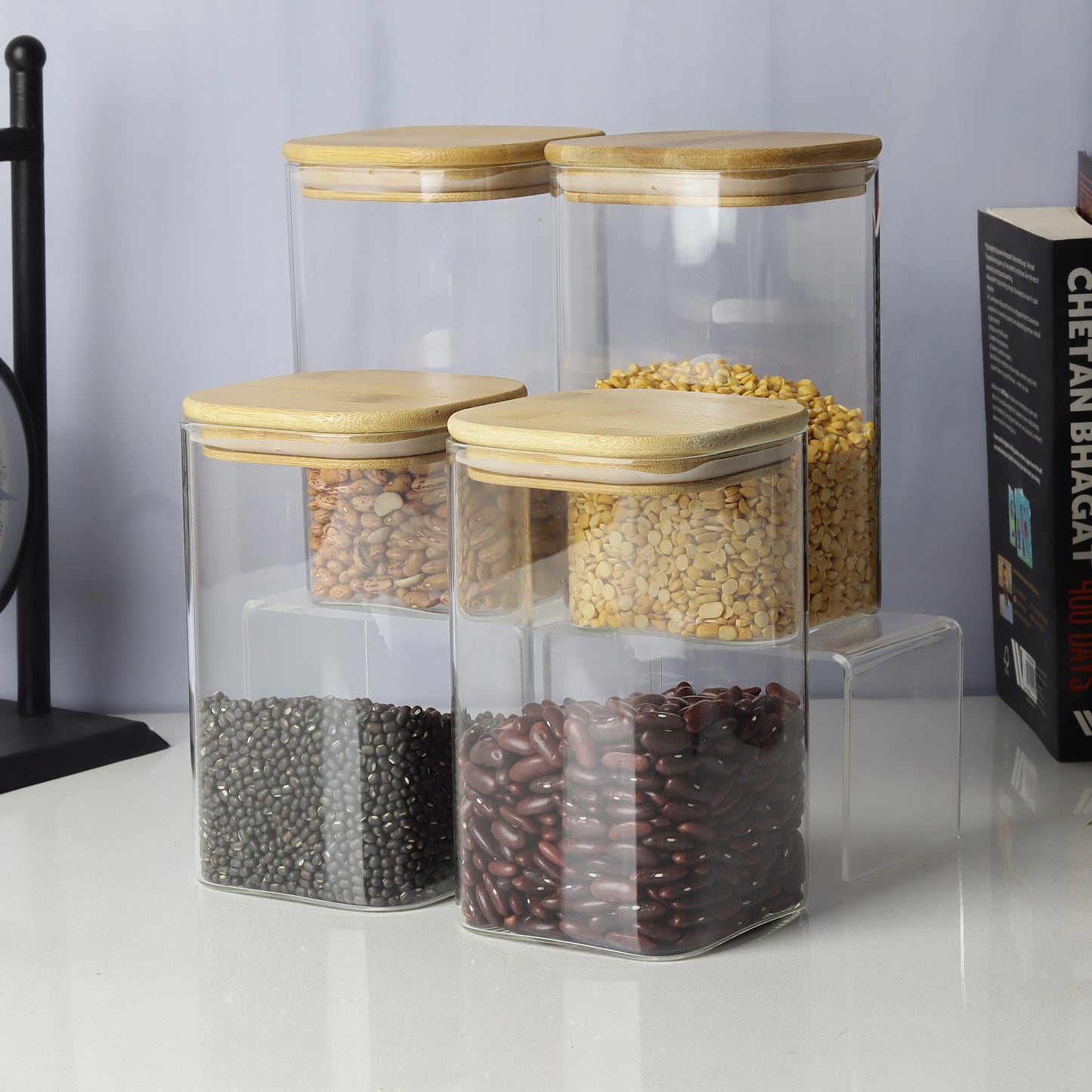 Glass jars/containers with stylish wooden lids - ideal for organized storage solutions