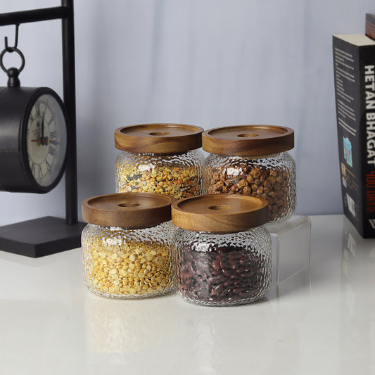 Glass jars/containers with stylish wooden lids - ideal for organized storage solutions