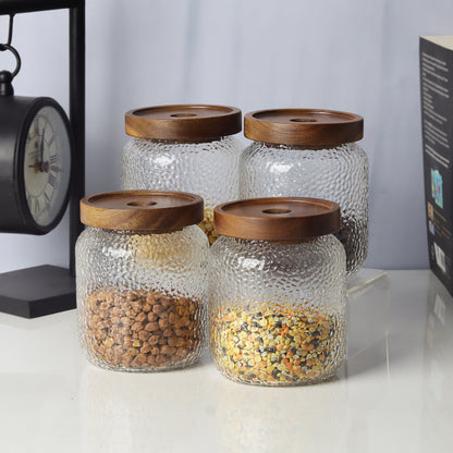 Glass jars/containers with stylish wooden lids - ideal for organized storage solutions