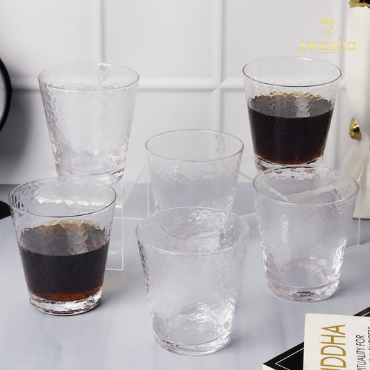 Set of 6 versatile glass tumblers - perfect for refreshing juices, whiskey and water.