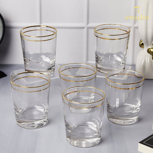 Set of 6 versatile glass tumblers - perfect for refreshing juices and water.