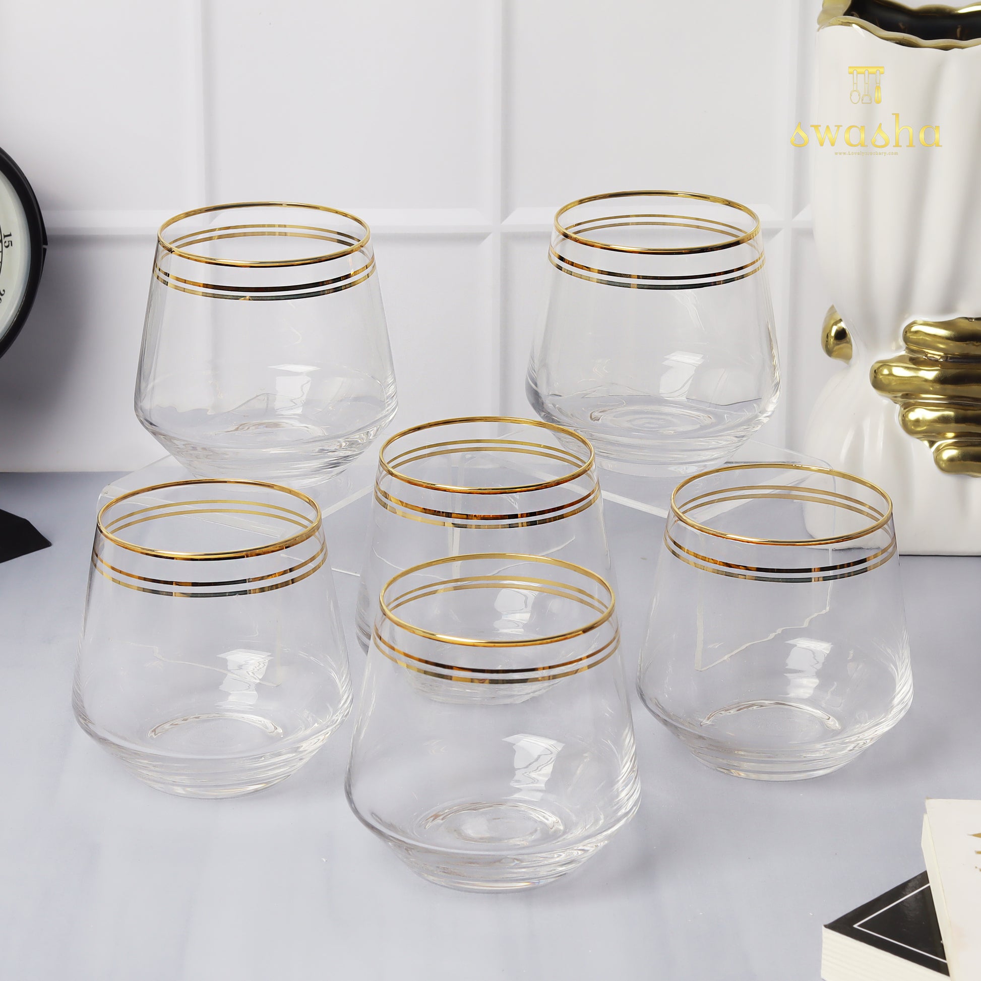 Set of 6 versatile glass tumblers - perfect for refreshing juices, whiskey and water.